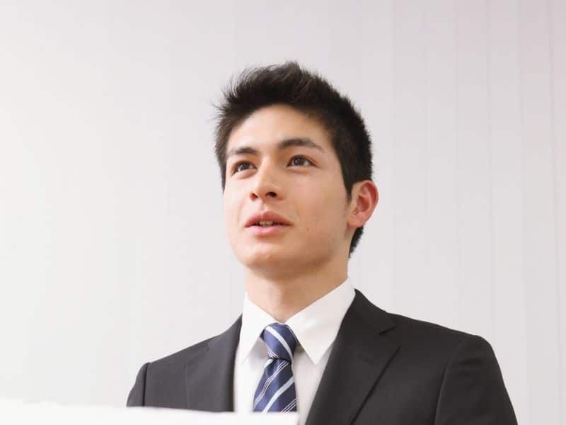 Professional speaking while presenting information in a formal setting