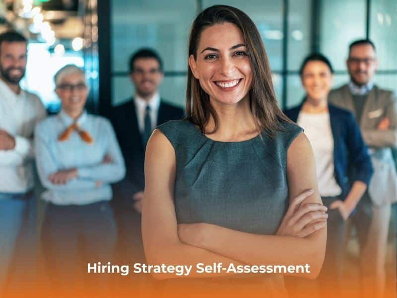 Confident professional standing with a supportive team in the background